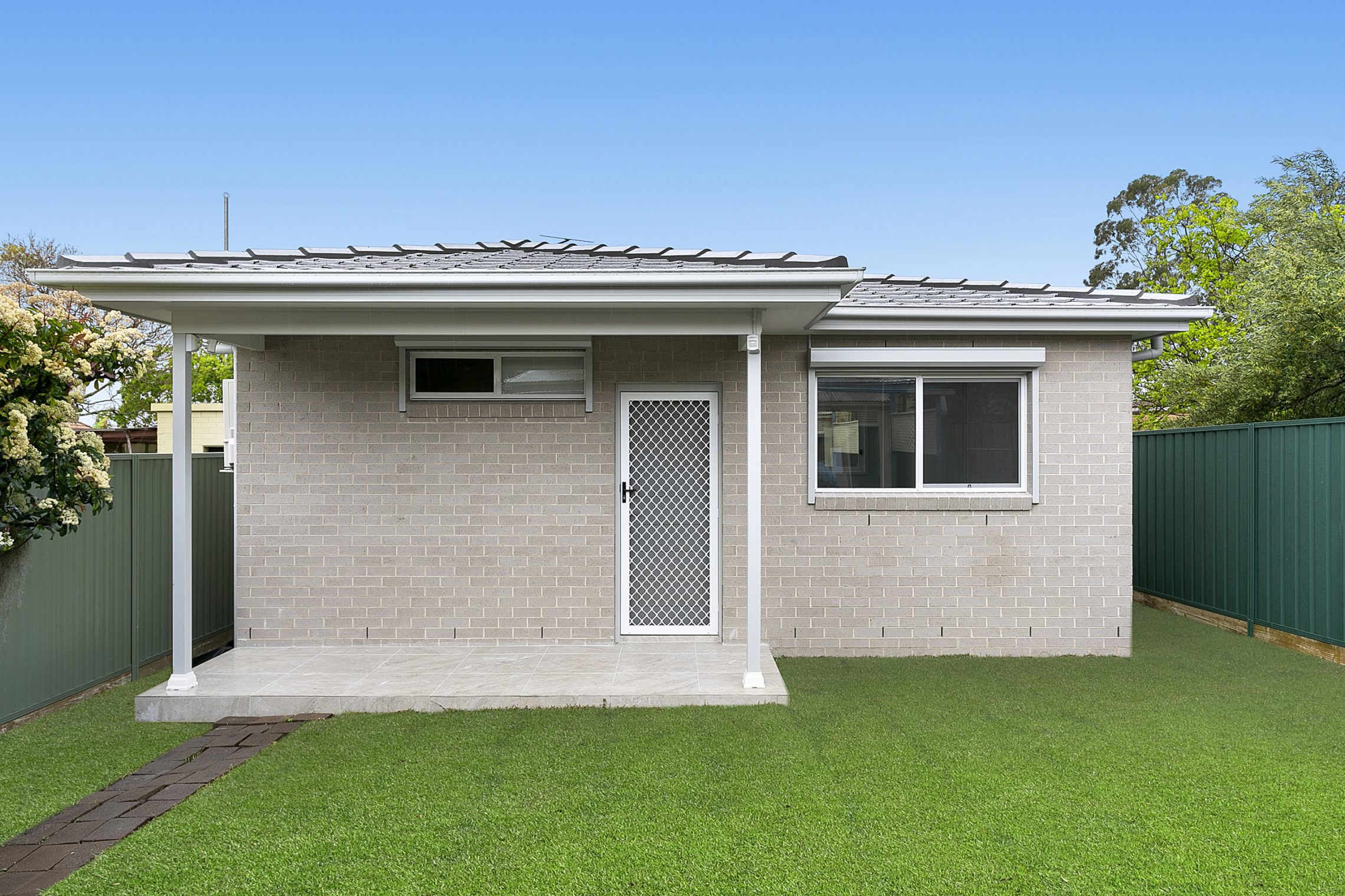 Backyard entry to brick granny flat