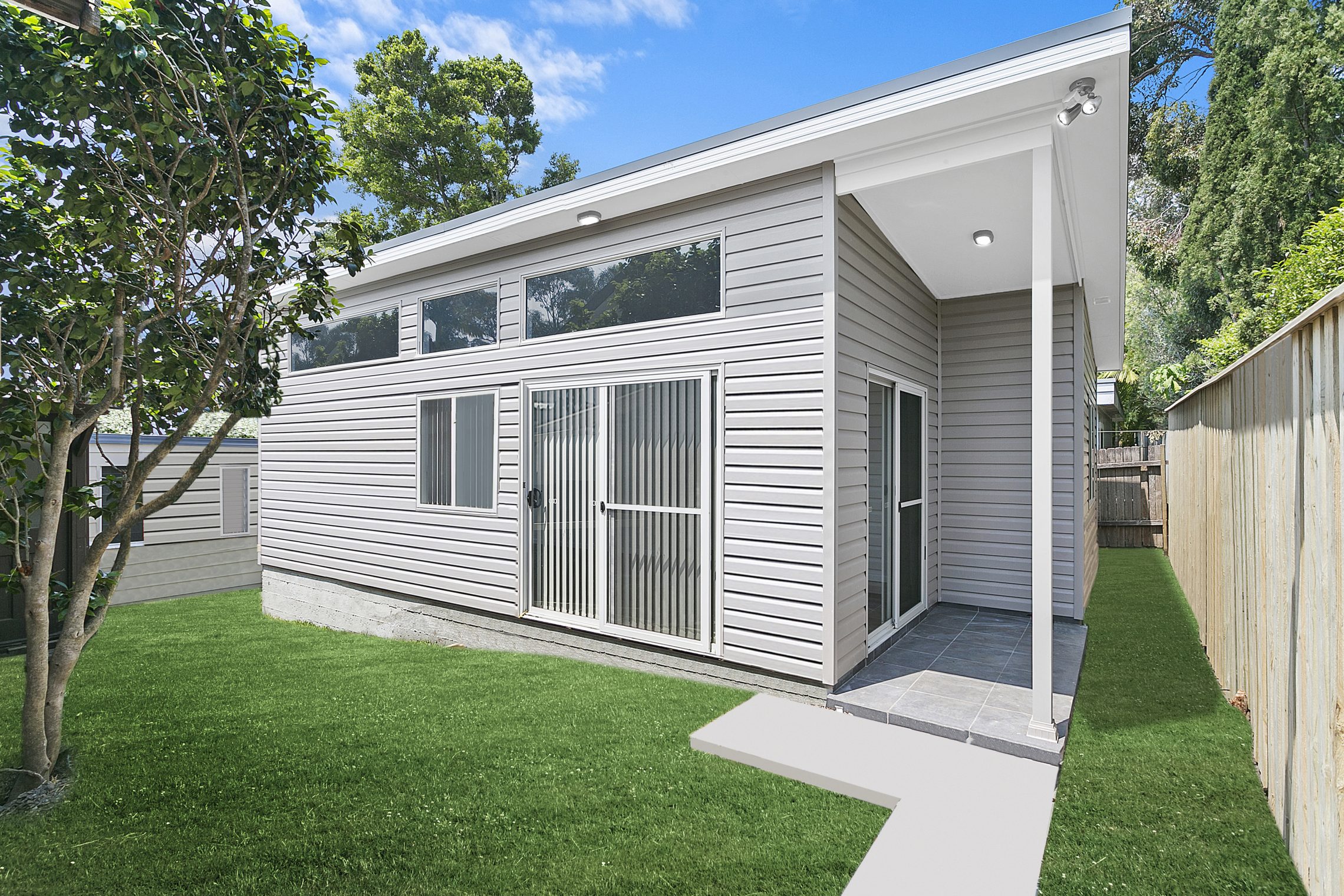 Granny flat with sliding door entry point and covered front door entry