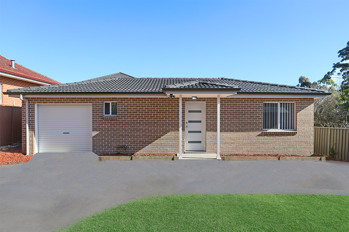 Brick granny flat with driveway and garage