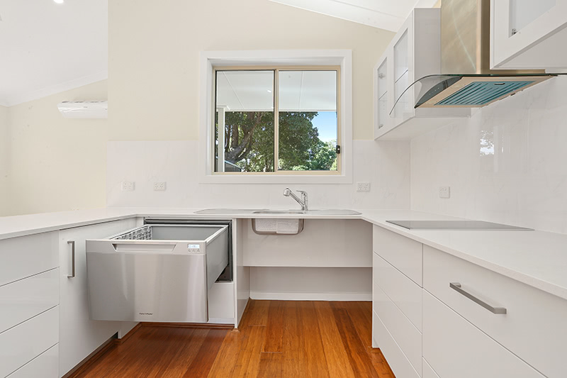 granny flat kitchen with sliding dishwasher