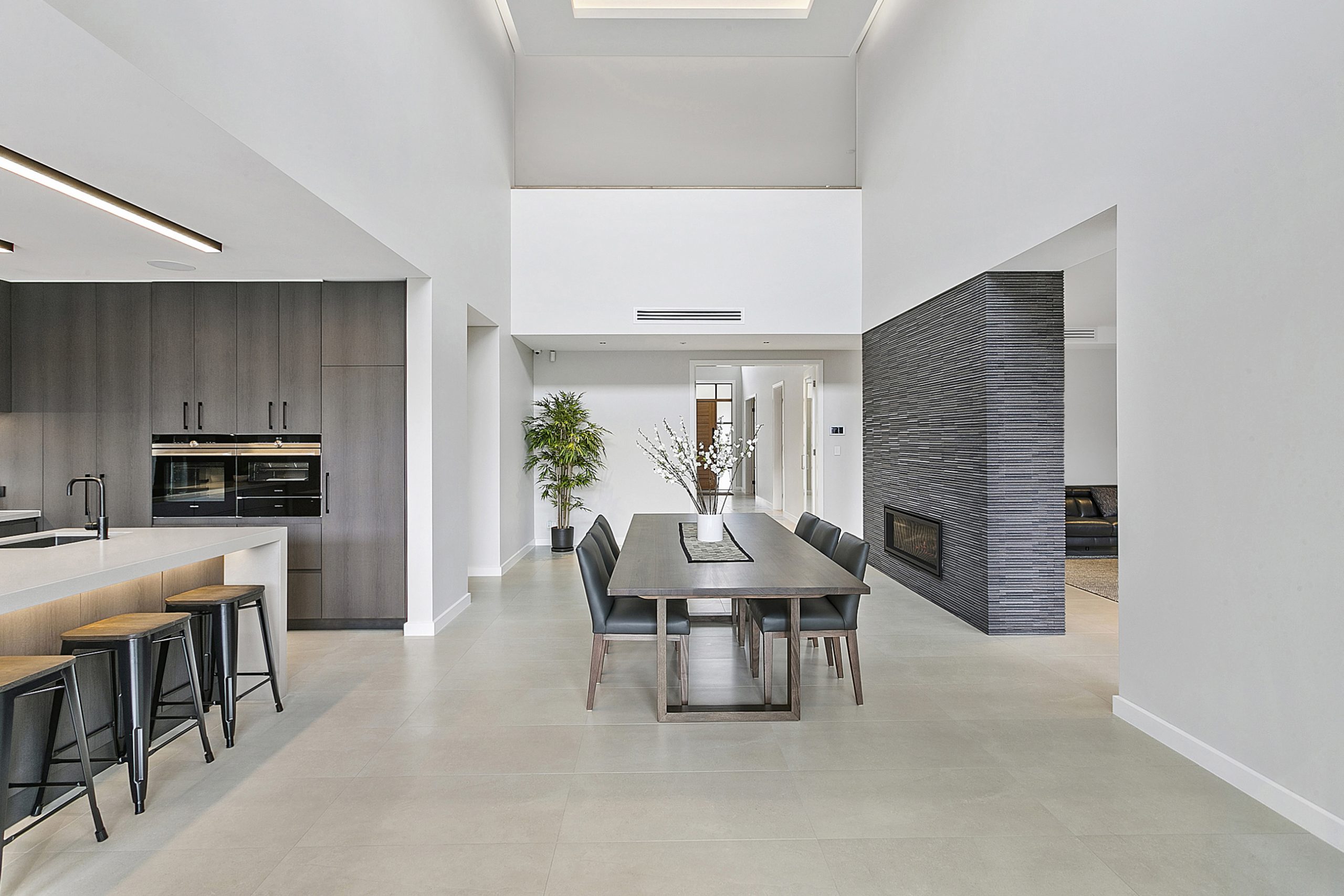 sleek dining room with steel dining table