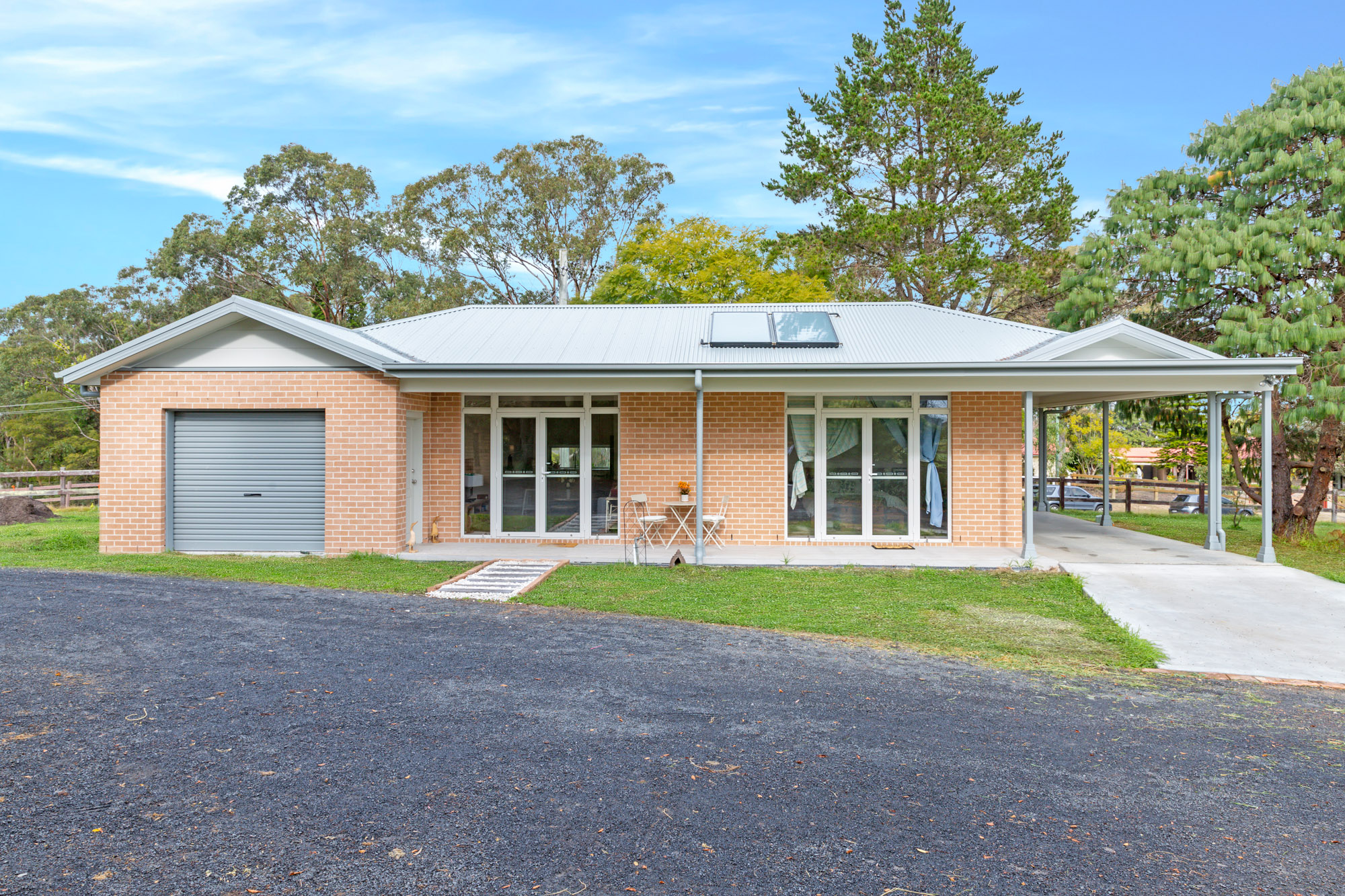 Large brick granny flat with covered car port and garage