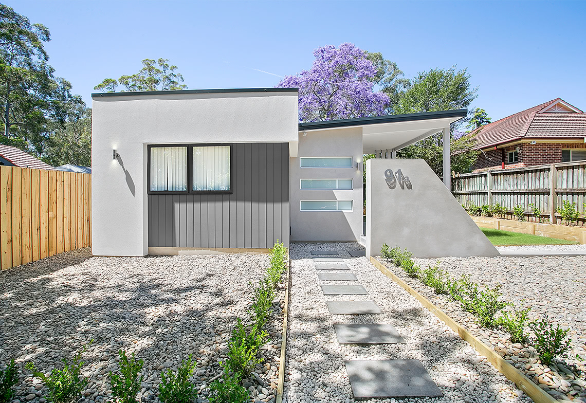 granny flat with stone footpath entry