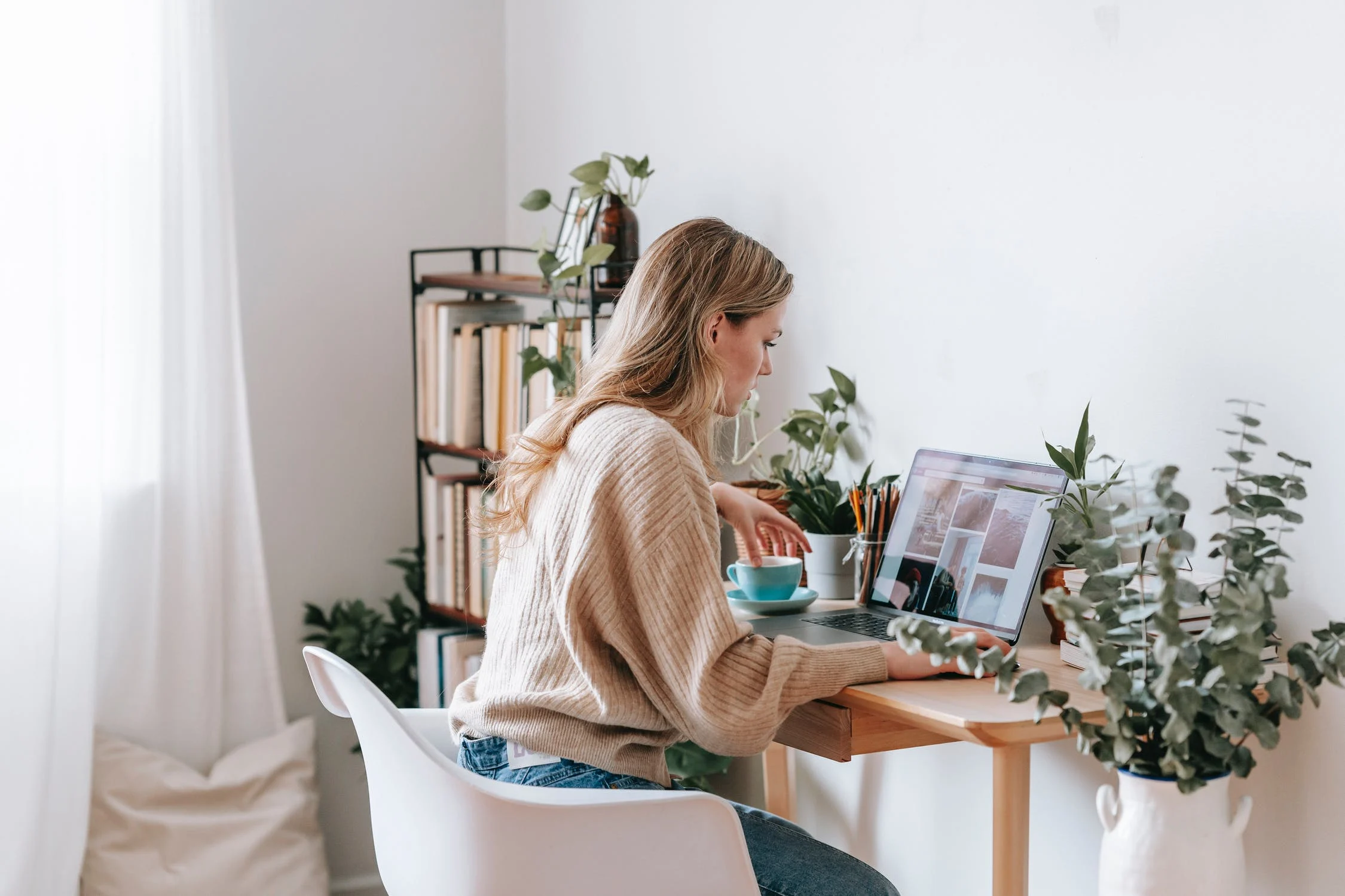 woman sitting at a desk in her home office