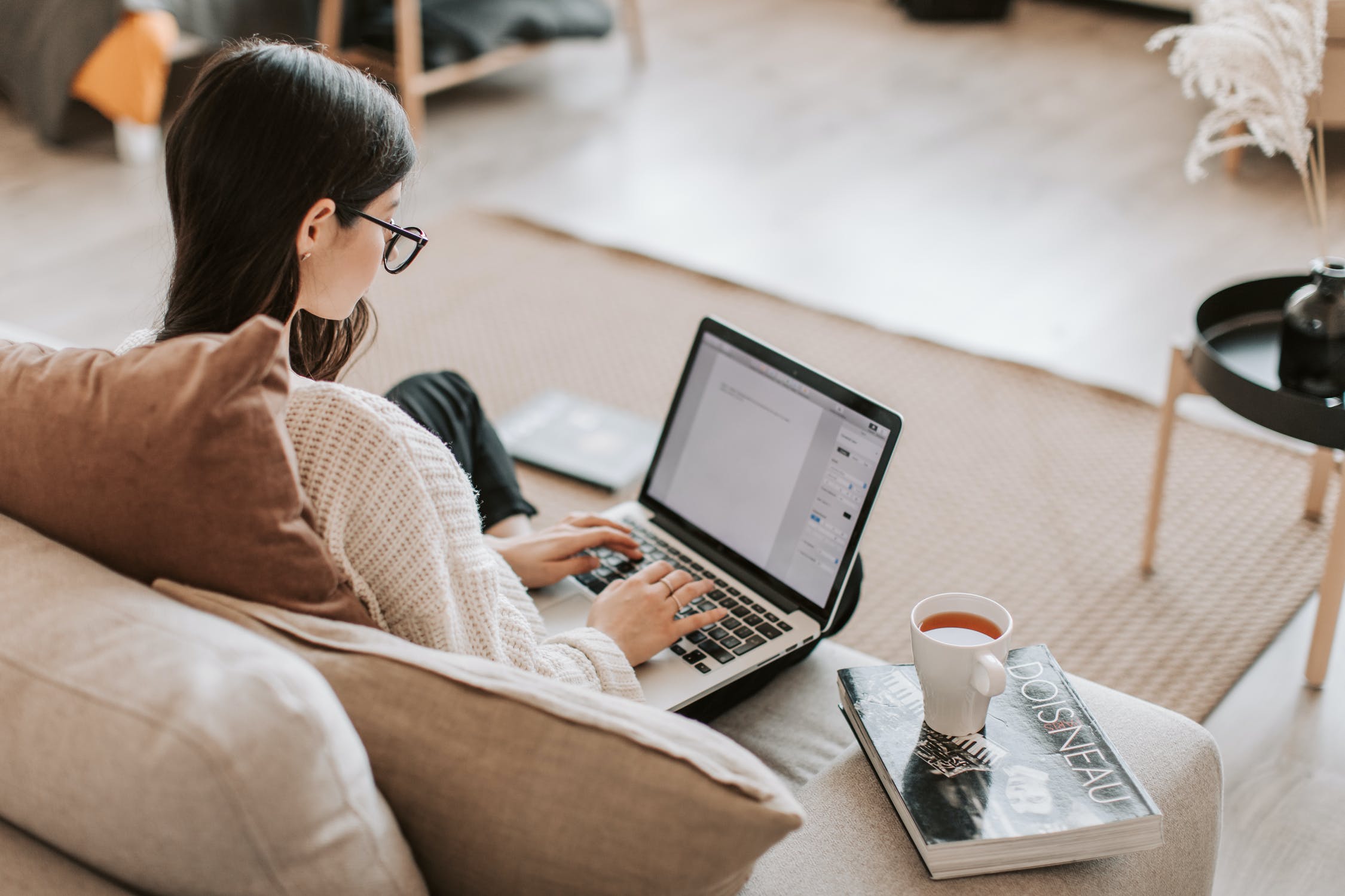 lifestyle pod user on her laptop