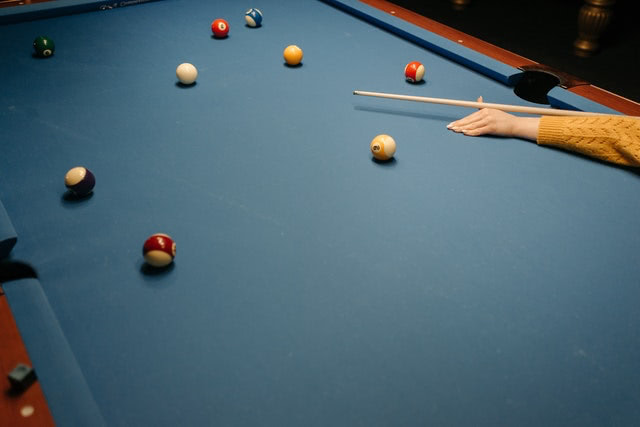 A pool table in a transformed granny flat studio