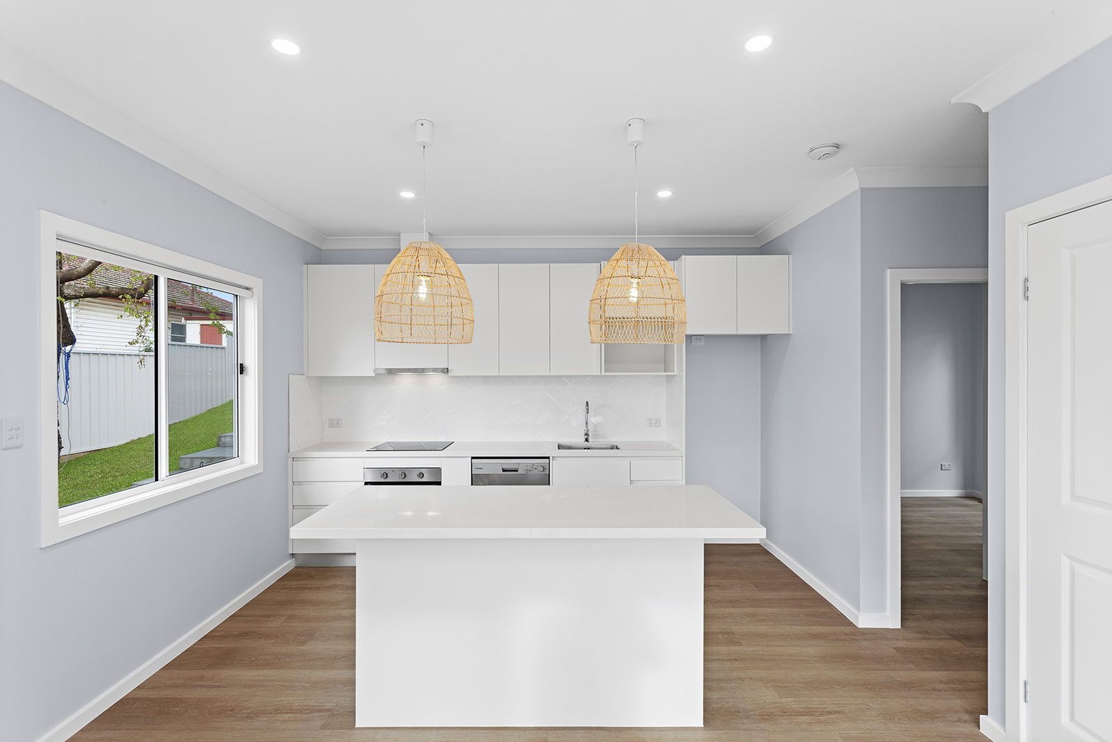 granny flat kitchen with ratton light