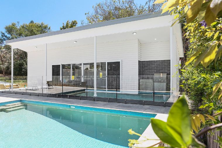 beautiful pool with cabana attached