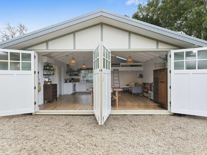 Open doors revealing the inside of a granny flat