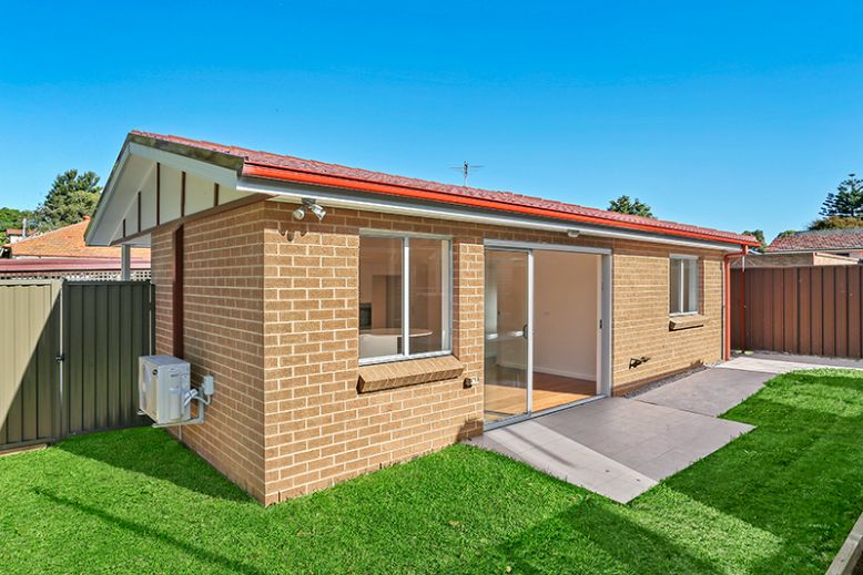 Wheelchair ramp in back of granny flat