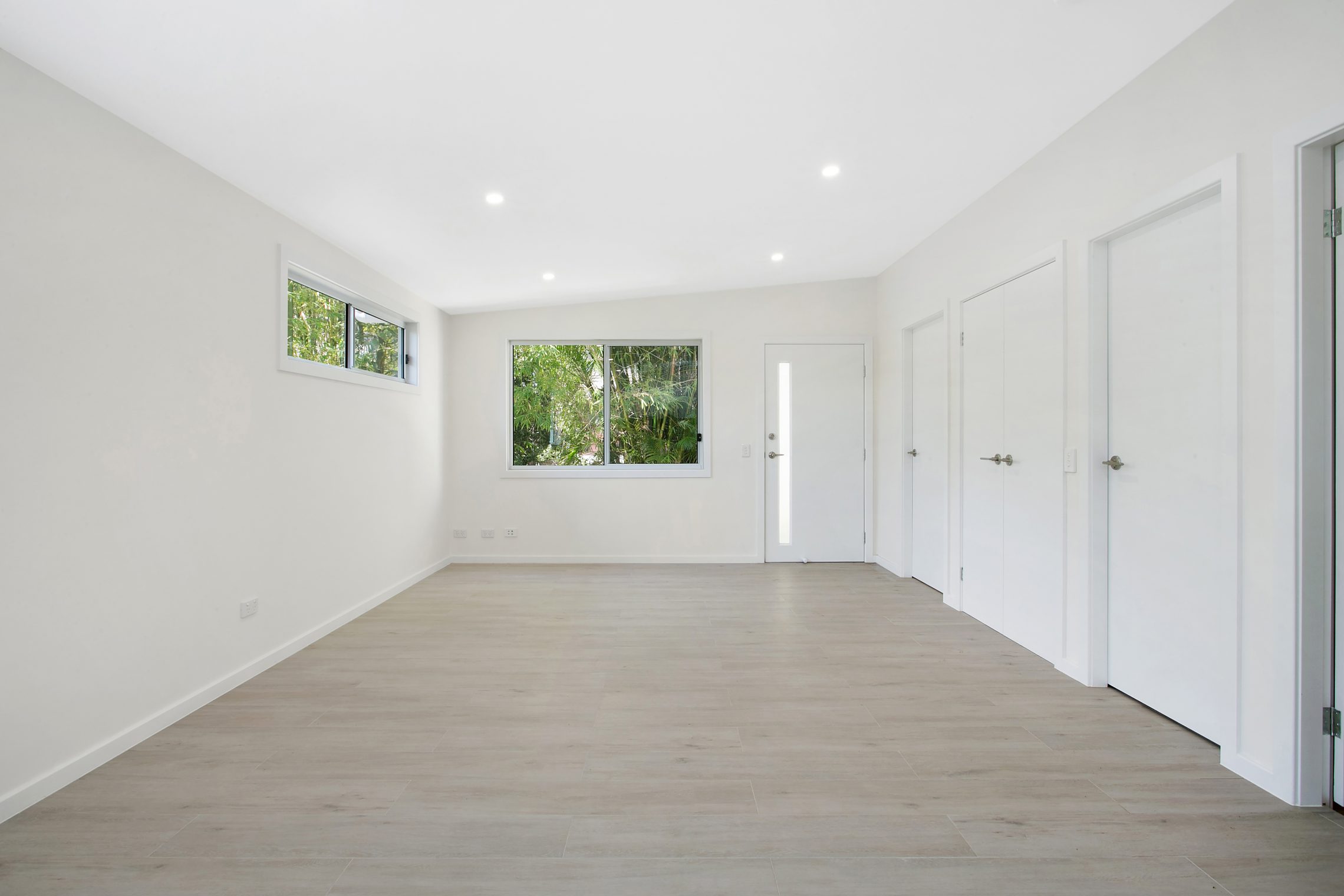 Living room with sloped ceiling